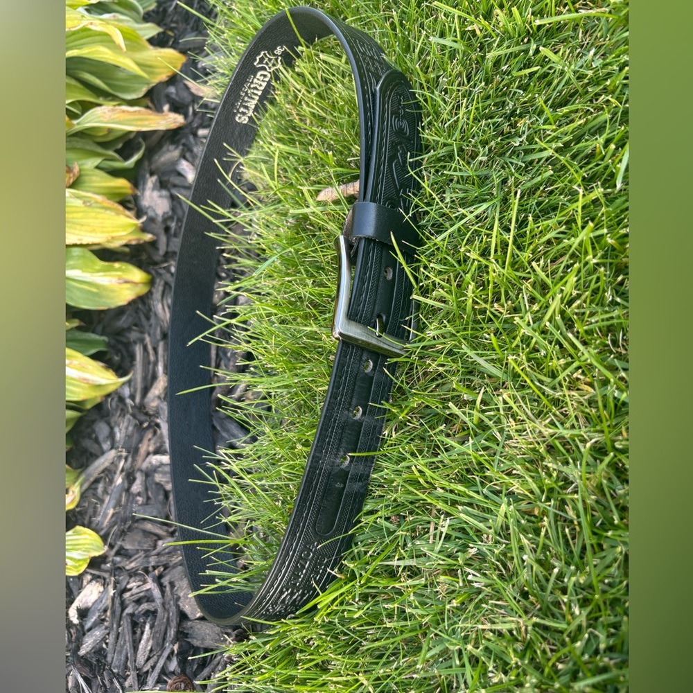 Grunts Black leather strip shows designs inspired by the Nazca Lines of Peru.